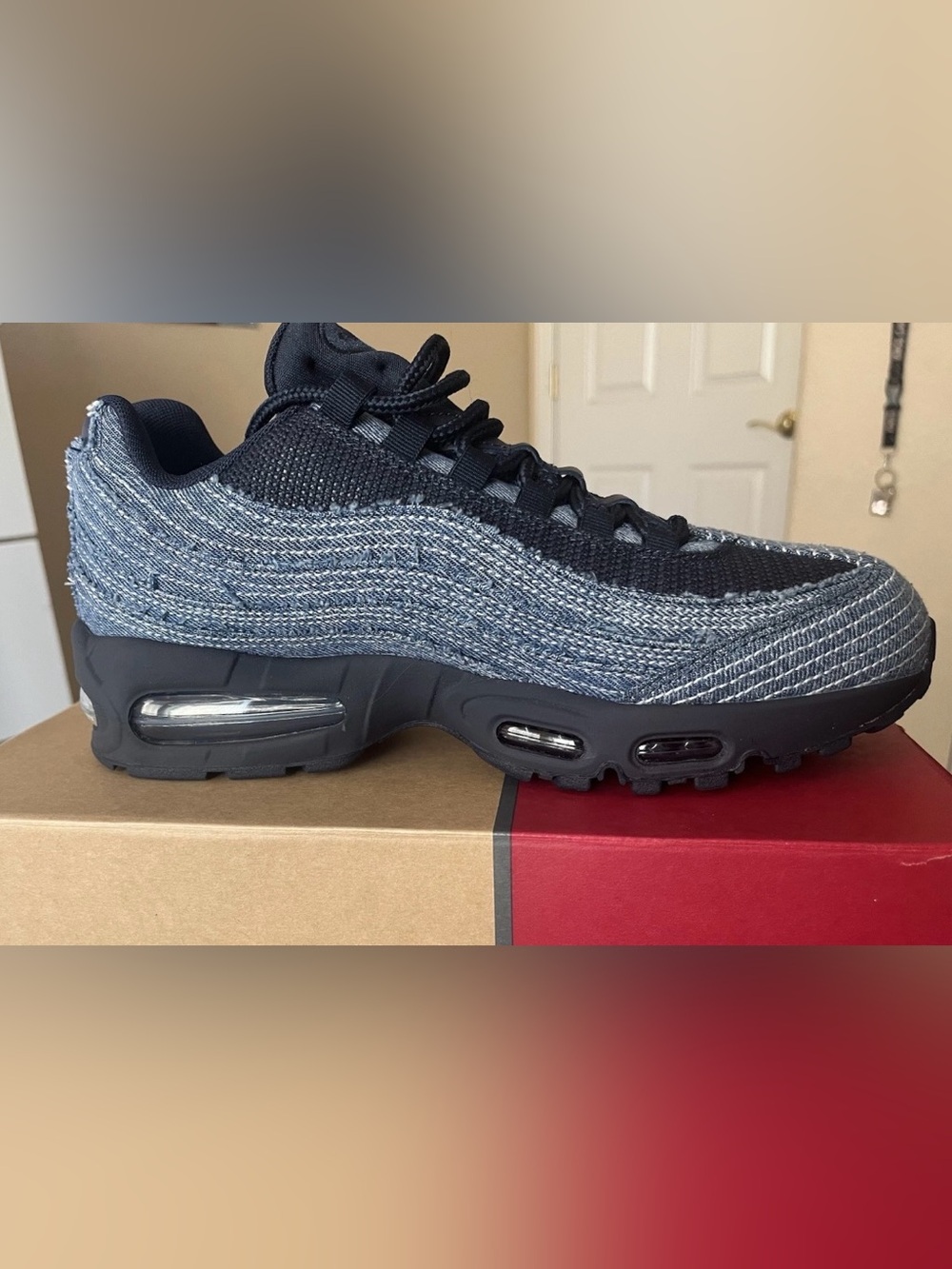 Nike Men’s Black and Heathered Blue Knit Sneakers